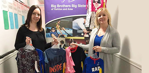 Charlotte Ross-Koteck (r) and Tryna Odland of Yorkton Big Brothers Big Sisters with some of the pajamas from their pajama drive.